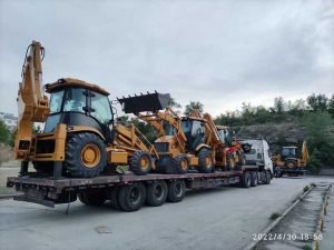 A-shipment-is-ready-to-be-loaded backhoe loader